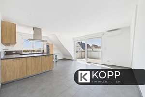 Attraktive Dachgeschosswohnung: 3 Zimmer, großer Balkon, EBK & TG mit Wallbox