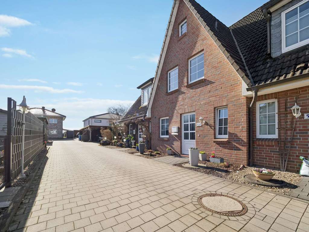 Immobilie in Bönningstedt - Gepflegtes Reihenmittelhaus in ruhiger Lage – solide Kapitalanlage mit stabilen Mietverhältnis! - Bild 1