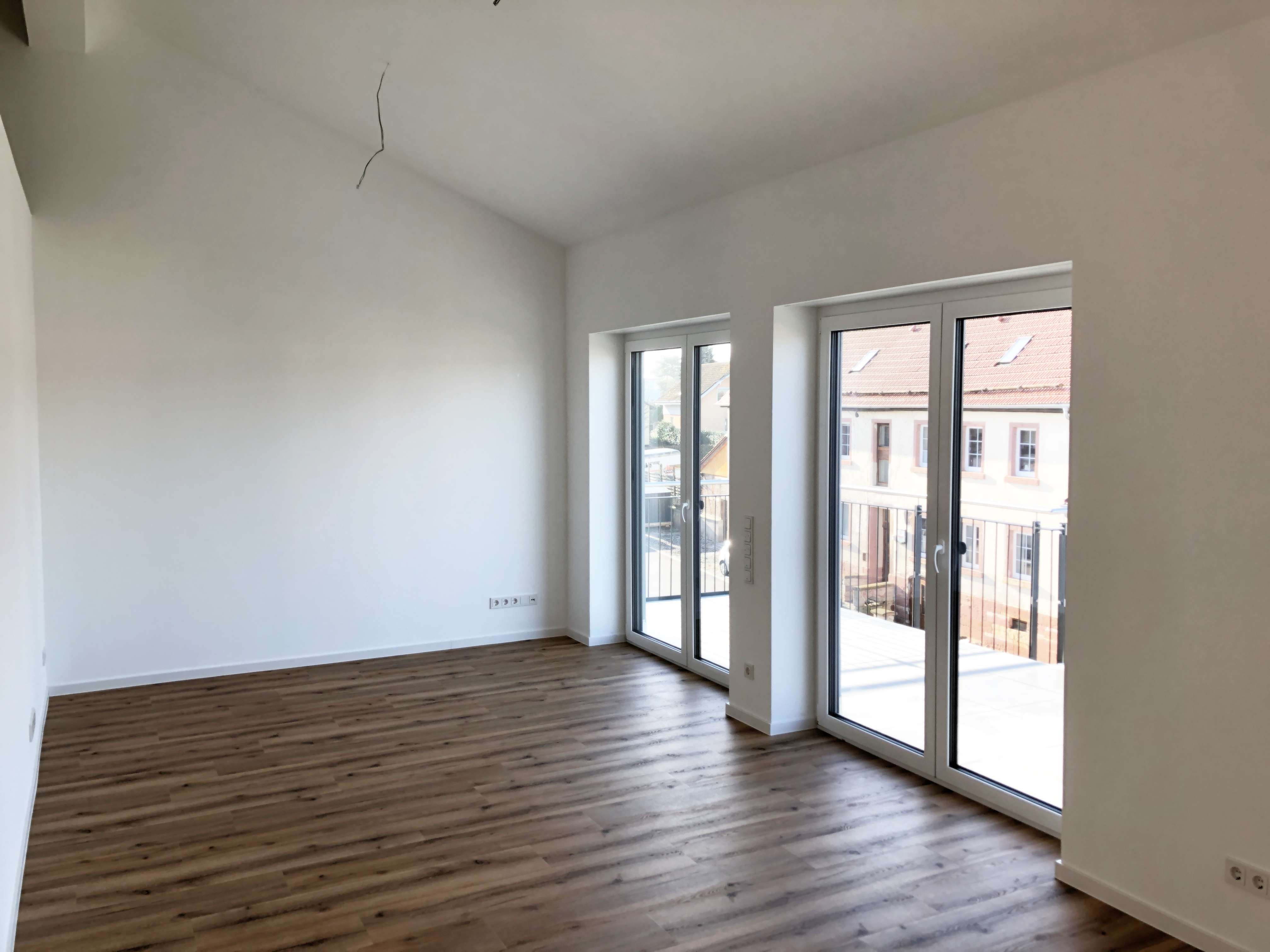 Immobilie in Eichenzell - Moderne Dachgeschosswohnung mit sonniger Dachterrasse - Neubau - Bild 0