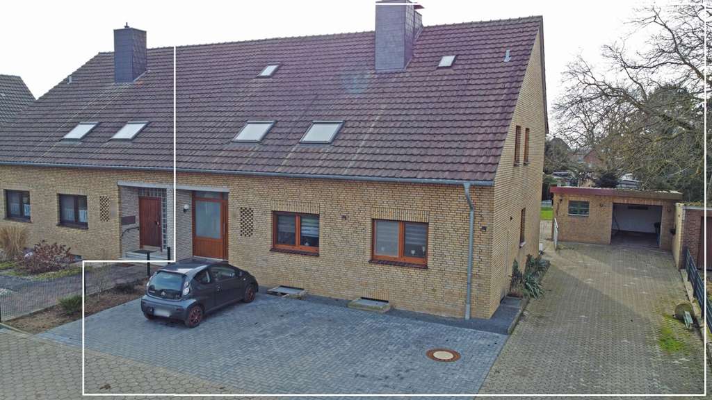Immobilie in Voerde (Niederrhein) - Gepflegtes Zweifamilienhaus in Voerde-Spellen mit großem Grundstück! - Bild 0