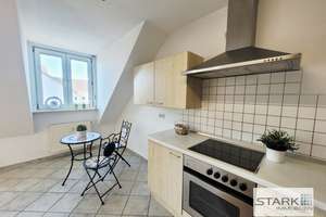 Stadtnah in Eisingen: bezugsfreie Maisonettewohnung mit Studio, Balkon, Gartenanteil & Carport! – Merowingerstraße 29, 97249 Eisingen – Vorschaubild 5