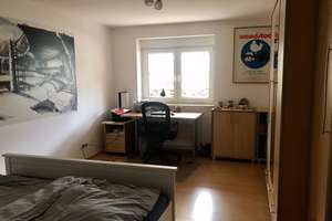 Helle Untergeschosswohnung mit  Terrasse