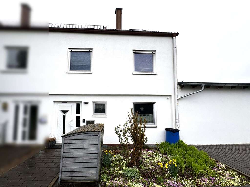 Immobilie in Holzheim - Doppelhaushälfte mit Garten und Terasse - Bild 0