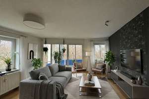 Charmante 3-Zimmerwohnung mit Wasserblick, Balkon sowie Tiefgaragen-Stellplatz in Schleußig!