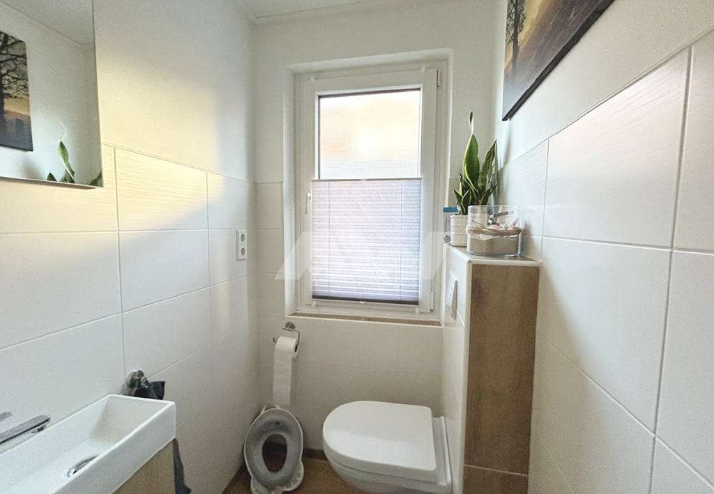 Immobilie in Marienhafe - Einfamilienhaus mit Garten und Dachterrasse in Marienhafe!
Objekt-Nr.: 26-005-S - Bild 3