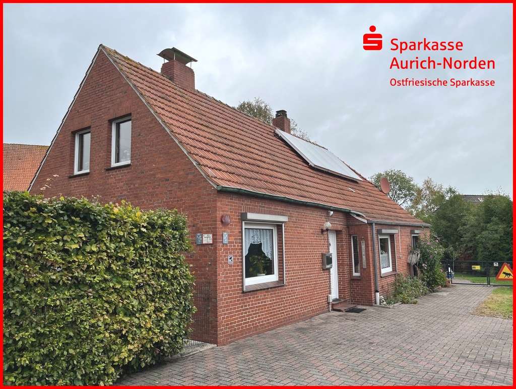 Immobilie in Ihlow - Gepflegtes Landhaus mit Nebengebäude in zentraler Wohnlage von Simonswolde - Bild 0