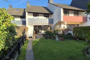 Gepflegtes Reihenmittelhaus mit großer Terrasse und liebevoll angelegtem Garten zu verkaufen – Gerhard-van-der-Poll Str. 10, 28832 Achim – Vorschaubild 1