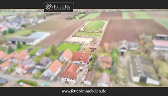 Bild von Pferdeimmobilie in Worms mit großem Mehrfamilienhaus und eigener Ovalbahn zu verkaufen!