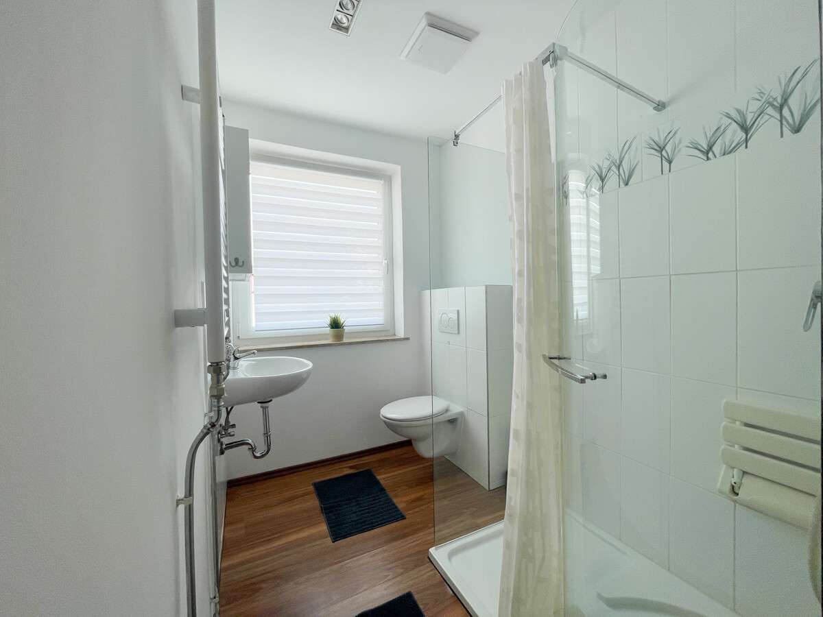 Immobilie in Aiterhofen - Viel Platz, klare Struktur – renditestarkes Mehrfamilienhaus in Aiterhofen - Bild 5