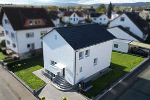 Modernes Einfamilienhaus mit Garten & Wärmepumpe - Energieeffizient und voll saniert in ruhiger Lage – Weserstraße 5, 61206 Wöllstadt – Vorschaubild 1