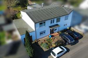 Großzügiges Ein- Zwei- Dreifamilienhaus in Köln Dünnwald mit wunderschönem Garten und großer Garage