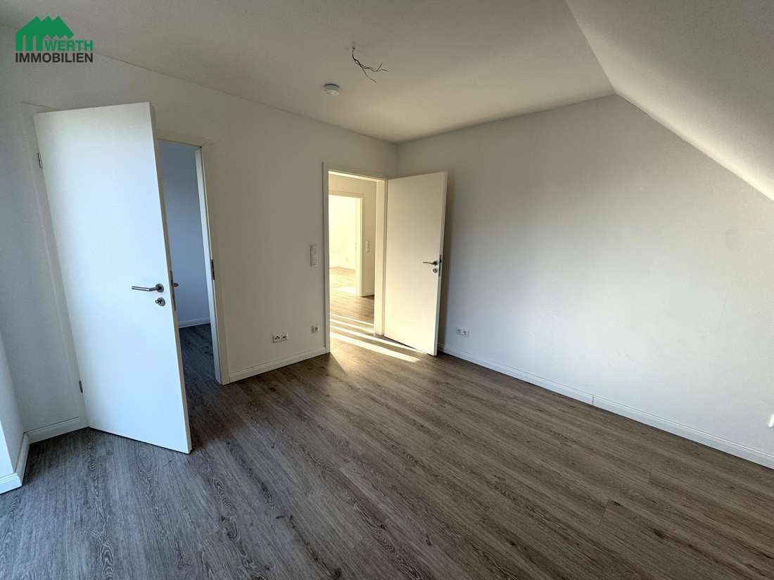 Immobilie in Beckdorf - Neuwertige KfW-55-Doppelhaushälfte mit Südgarten & Ausbaureserve in Beckdorf *** 360 Grad Rundgang * - Bild 1