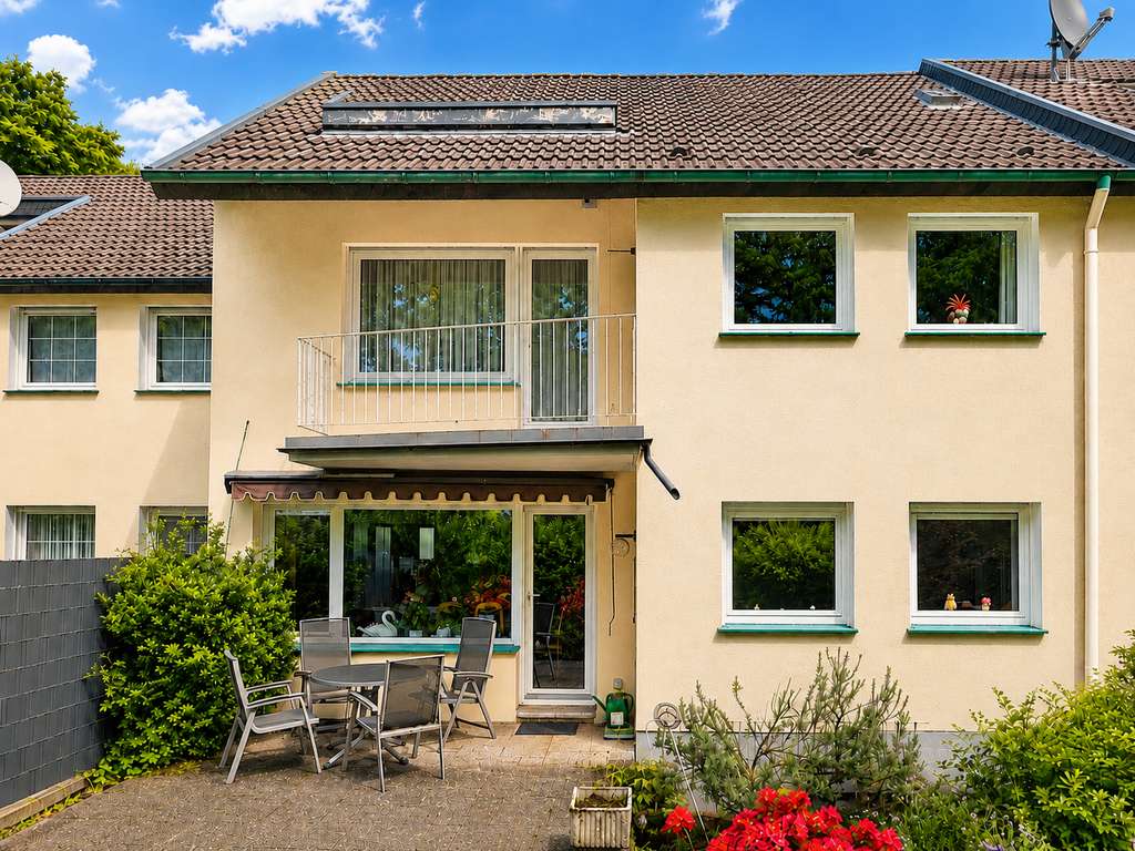 Immobilie in Wülfrath - Familienfreundliches Reihenhaus mit Garten, Balkon und Stellplatz in zentraler Lage von Wülfrath - Bild 0