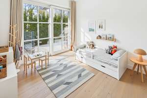 Exklusives Wohnen auf zwei Ebenen – lichtdurchflutete Garten-Maisonette mit Süd-West-Ausrichtung