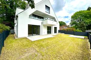 Moderne und helle Erdgeschosswohnung, mit schönem Sonnengrundstück und eigenem Carport!