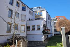 Charmante Maisonettewohnung mit Aufzug und Tiefgaragenstellplatz in bester Lage