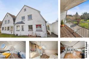 Familienfreundliche Maisonette-Wohnung mit 5 Zimmern, Balkon, Garten und Garage