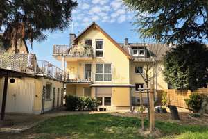 Helle 4 Zimmer Erdgeschosswohnung 109qm plus Soutterain-Einliegerwohnung/-büro 44qm plus Garage