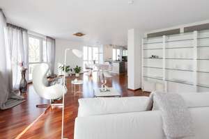 Moderne 3-Zimmer-Wohnung mit seitlichem Isarblick in Bestlage