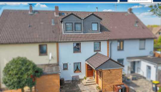 Bild von Familienfreundliches Reihenmittelhaus mit ca. 7 m Breite, 6 Zimmern und Garage in ruhiger Lage