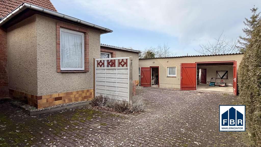 Immobilie in Lübz - Ihr bezahlbares Zuhause mit Wintergarten und Garage in Lübz - Bild 2