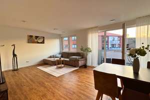 Großzügige 2-Zimmer-Neubauwohnung im Erdgeschoss mit Terrasse und eindrucksvollem Raumgefühl auf 