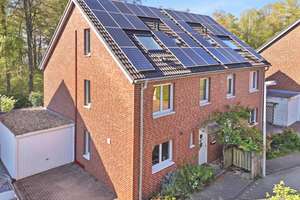 Energieeffizientes Einfamilienhaus mit Wintergarten und Blick in den Kottenforst