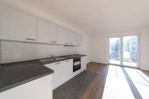 Erstbezug! - 2 Raumwohnung mit Einbauküche und Tiefgaragenstellplatz - WE14