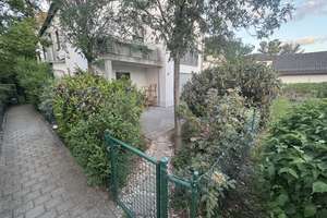 3-Zimmer EG-Wohnung mit großem Privatgarten & Garage – Waldtrudering