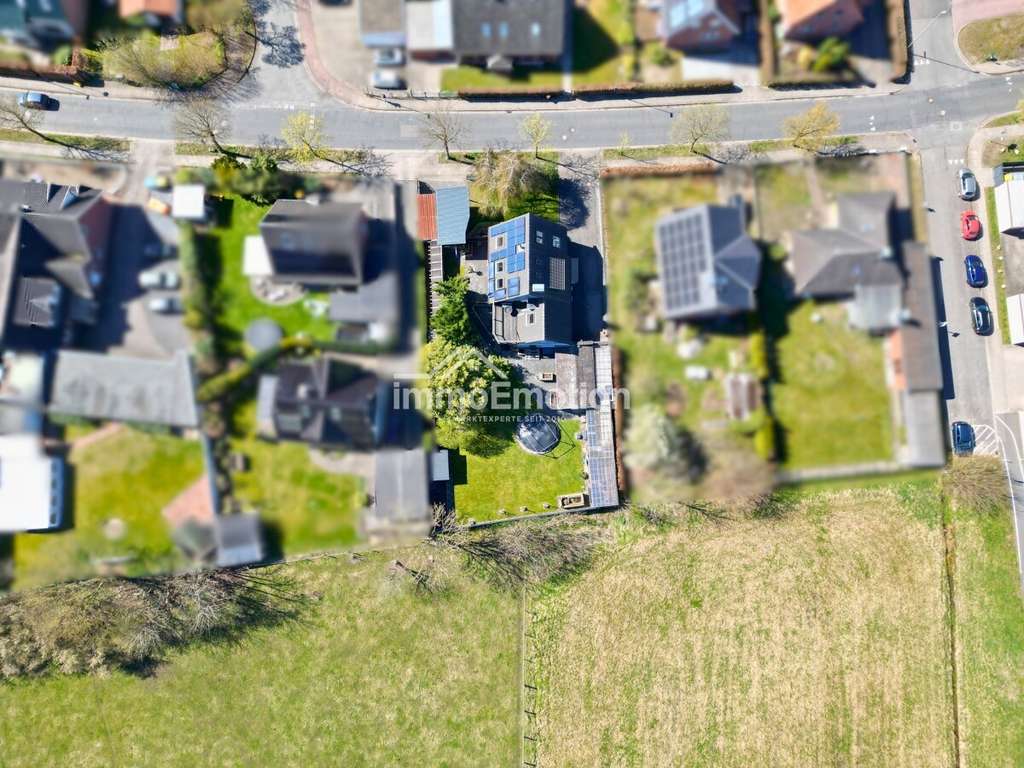 Immobilie in Tostedt - Natur vor der Tür, Stadt in Reichweite – Familienhaus auf großem Grundstück, teilweise  modernisiert - Bild 1