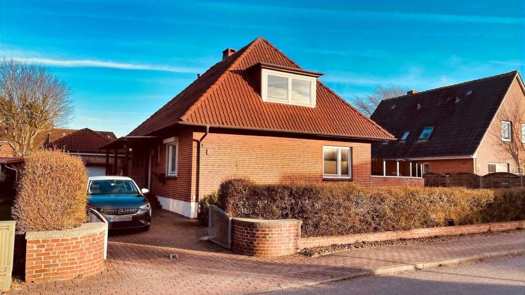 Immobilie in Wrixum - Einfamilienhaus mit Garage und großem Garten - Bild 1