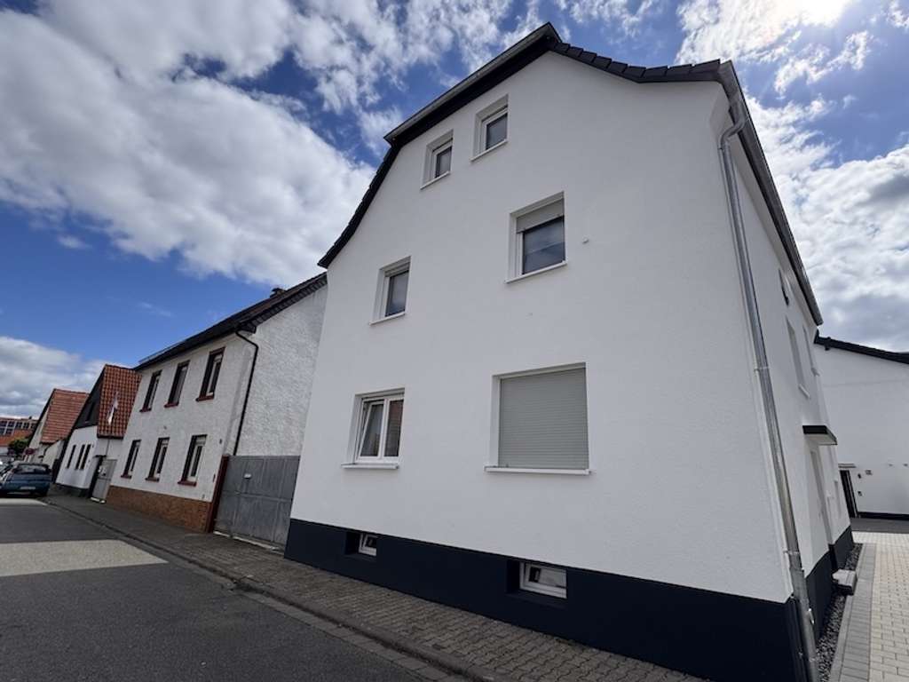 Immobilie in Büttelborn - Stilvolles Wohnen mit Charme! Anspruchsvoll saniertes 2 Familienhaus -im WEG-Verbund- in Worfelden - Bild 0