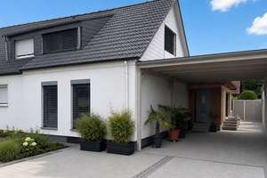 Stilvoll wohnen in bester Lage–Exklusive Doppelhaushälfte mit Designer-Ausstattung in Ma-Gartenstadt