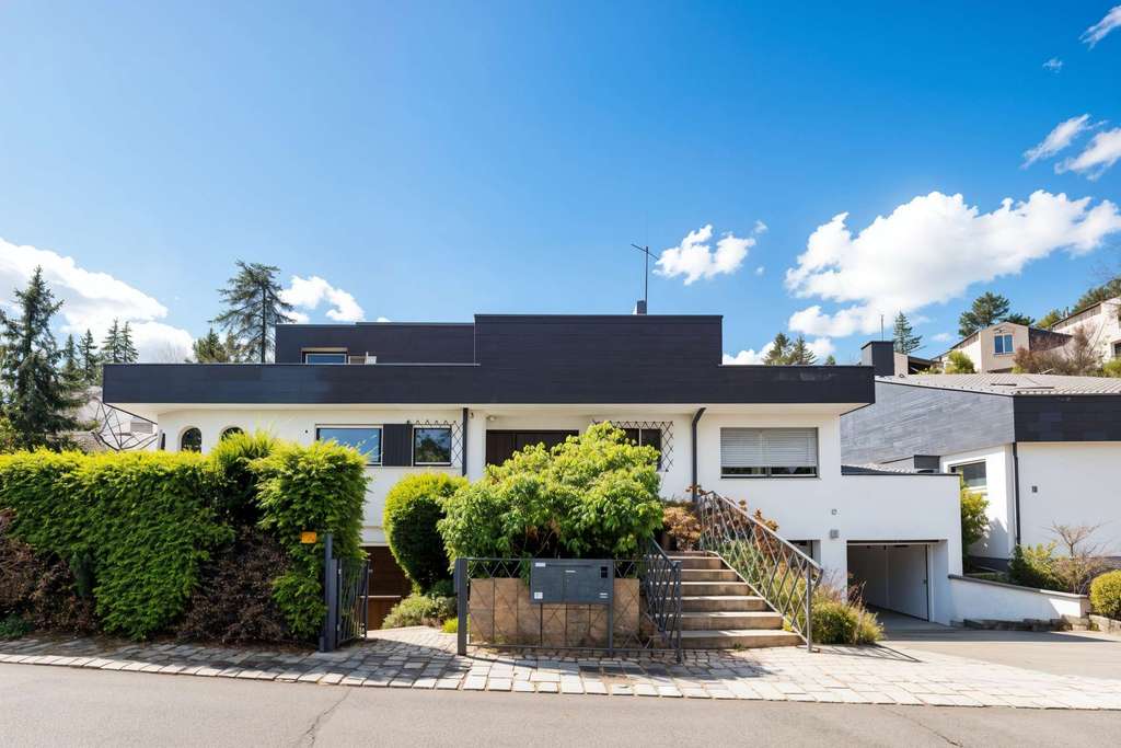 Immobilie in Gerlingen - Ein Zuhause mit Charakter – Architektenhaus mit Einliegerwohnung im Grünen - Bild 1