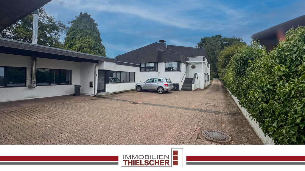 Adolfosee: Wohnhaus mit Einliegerwohnung, Büro, Lager, 5 Garagen und ausreichend Stellfläche