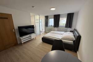 Modernes Studio Apartment mit Garten in Top Lage