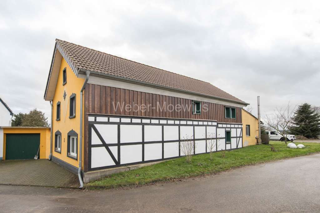 Immobilie in Lohmar - *Fachwerktraum* außergewöhnliches Einfamilienhaus mit Terrasse, Sauna, Garage + Doppelcarport - Bild 2