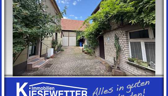 Bild von Einfamilienhaus mit Nebengebäude, Scheune und Garage – ehemaliger Winzerbetrieb in Mettenheim