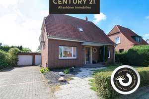 Einfamilienhaus mit zwei Grundstücksanteilen