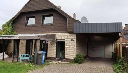 Bild von Charmantes Einfamilienhaus mit Carport, Garten & Kamin – teilsaniert und lichtdurchflutet!