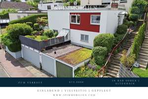 Modernes Familienzuhause im Bungalowstil mit Terrasse, Garten & 3 Garagen