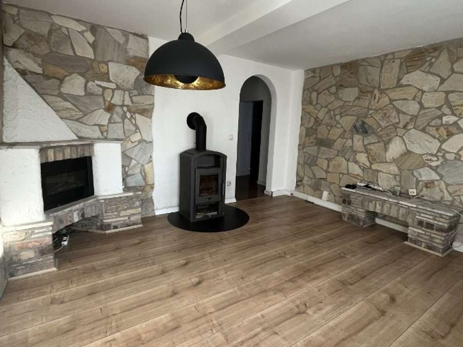 Wohnzimmer mit Kamin