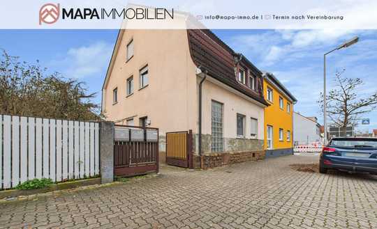 Sanierungsbedürftiges Mehrfamilienhaus mit Garagen, Garten und Entwicklungspotenzial in Neureut