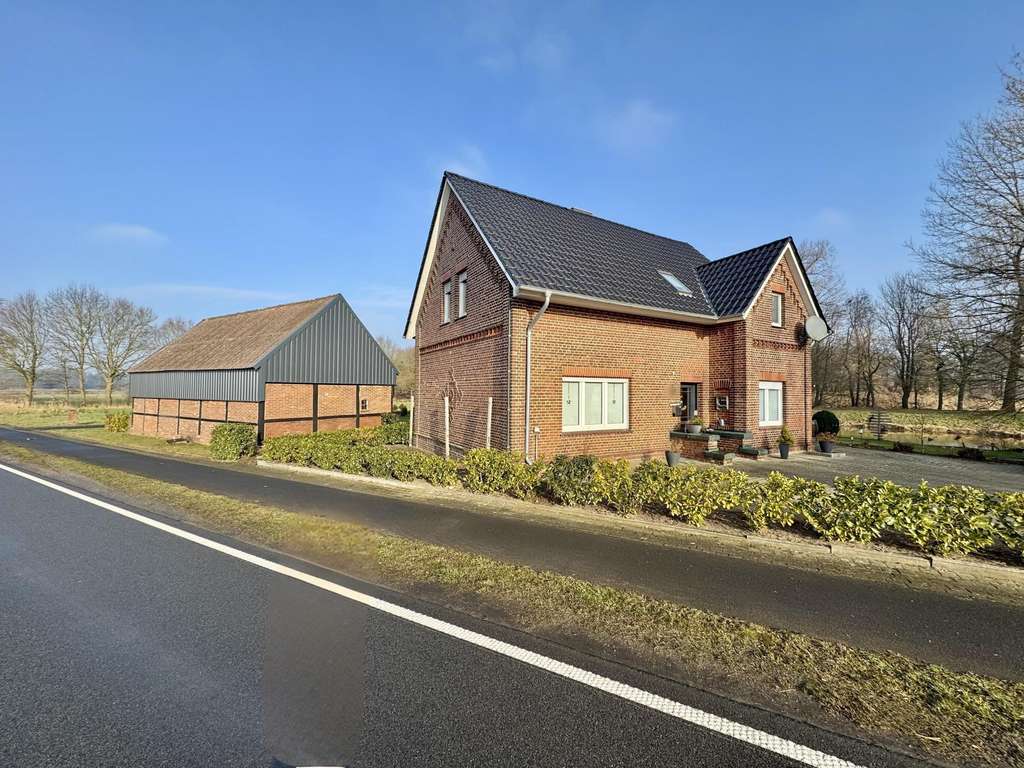 Immobilie in Wietmarschen - Großzügiges Wohnhaus in idyllischer Kanallage von Wietmarschen
 - Bild 1