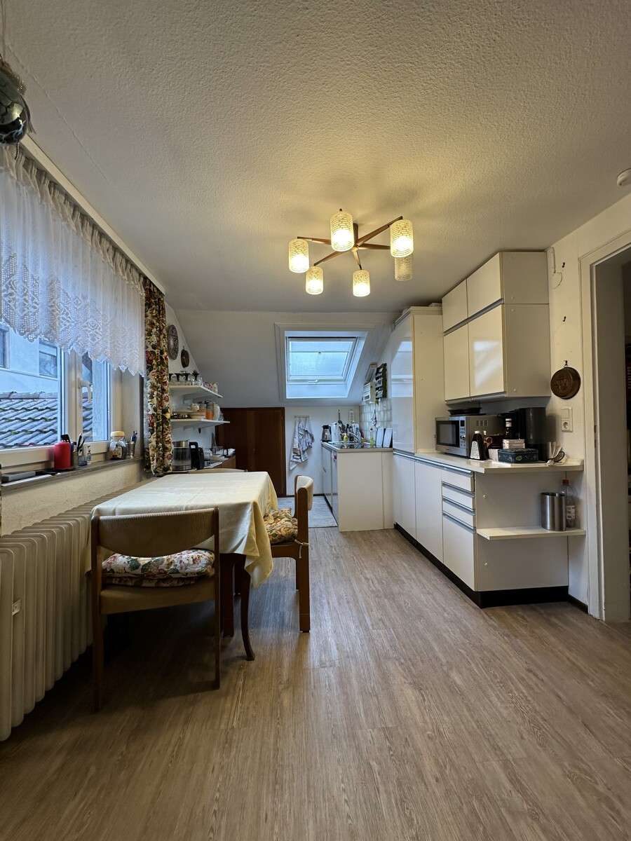 Immobilie in Weißbach - Solides Anlageobjekt: Gepflegtes 3-Familienhaus mit Garage, Carport & vermieteten Wohnungen - Bild 2