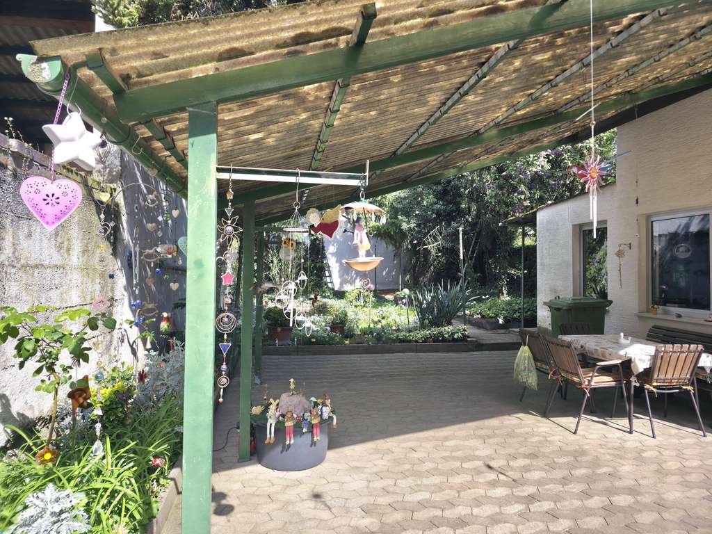 Immobilie in Weinheim - Einfamilienhaus mit schnuckeligem Garten und Nebengebäude - Bild 1