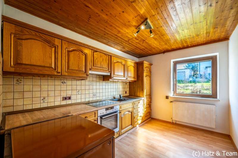 Immobilie in Tittling - Investieren im Grünen
Vermietetes Einfamilienhaus mit Potenzial in toller Lage! - Bild 1