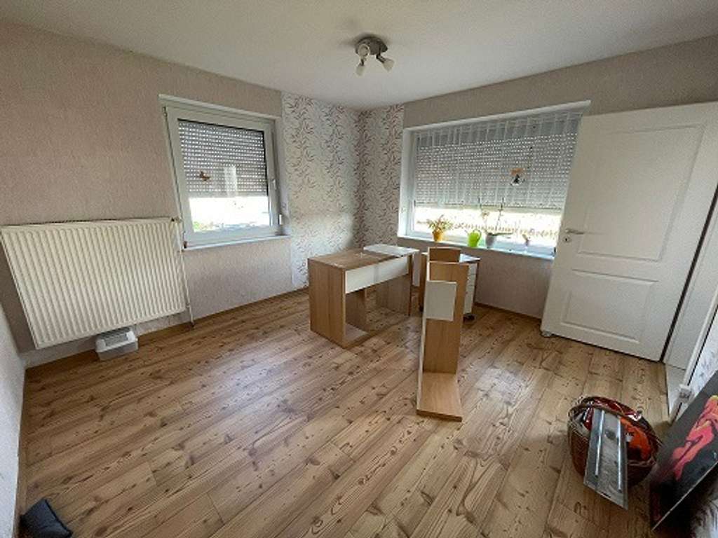 Immobilie in Moormerland - Gepflegte Doppelhaushälfte mit großem Grundstück und Entwicklungspotenzial - Bild 3