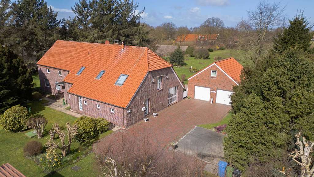 Immobilie in Großheide - Exklusives Wohnensemble inmitten der Natur - Bild 1