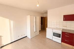 Bezugsfreie 1-Zimmer-Wohnung mit Einbauküche, Teilmöblierung & Stellplatz
